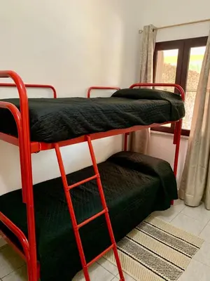 Letto o letti in una camera di Casa Gesuino