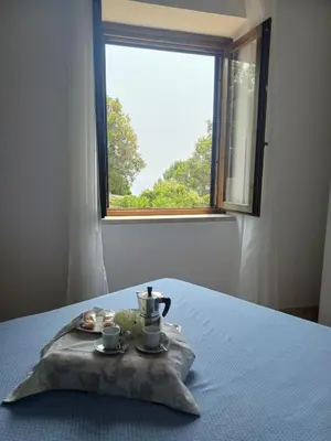 Letto o letti in una camera di Villa Acquamarina