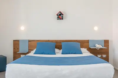 Letto o letti in una camera di Residence with panoramic swimming pool in Porto San Paolo just 850 mt from the sea