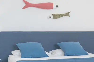 Letto o letti in una camera di ISA - Residence with panoramic swimming pool in Porto San Paolo just 850 mt from the sea