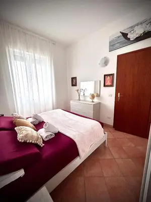 Letto o letti in una camera di Casa Olbia Centro