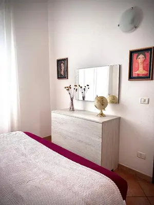 Letto o letti in una camera di Casa Olbia Centro