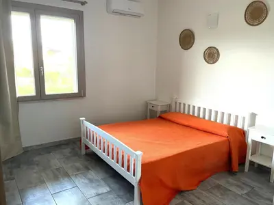 Letto o letti in una camera di Casa Deborah