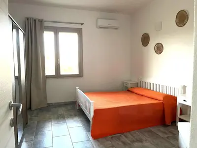 Letto o letti in una camera di Casa Deborah