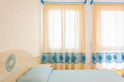 Letto o letti in una camera di Charming Baia Marina with Stunning Views 1BR
