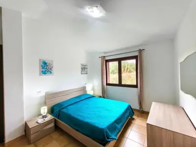 Letto o letti in una camera di Apartment with a sea-view terrace