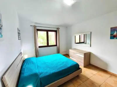 Letto o letti in una camera di Apartment with a sea-view terrace