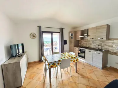Cucina o angolo cottura di Apartment with a sea-view terrace