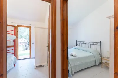 Letto o letti in una camera di Residenze Gallura 6 people Apartment