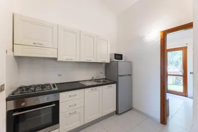 Cucina o angolo cottura di Residenze Gallura 6 people Apartment
