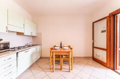 Cucina o angolo cottura di Le Dimore 4 people Apartment