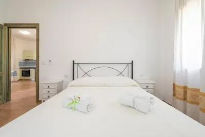 Letto o letti in una camera di Sardinian flat close to stunning beaches