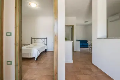 Letto o letti in una camera di Sardinian flat close to stunning beaches