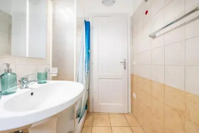 Bagno di Relaxing apartment close to Santa Lucia beach