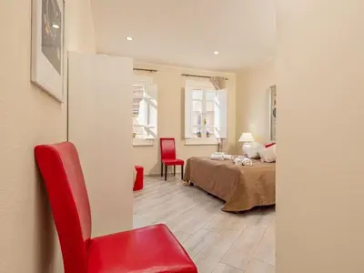 Letto o letti in una camera di Apartment Sehr zentral in Olbia by Interhome