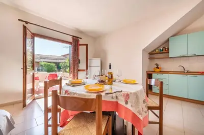 Cucina o angolo cottura di San Teodoro flat steps from the beach