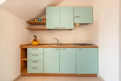 Cucina o angolo cottura di San Teodoro flat steps from the beach