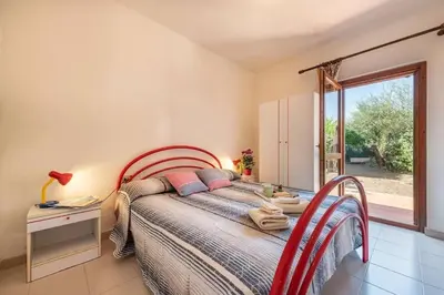 Letto o letti in una camera di Perfectly located flat in San Teodoro
