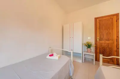 Letto o letti in una camera di Perfectly located flat in San Teodoro