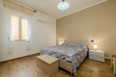 Letto o letti in una camera di AD House