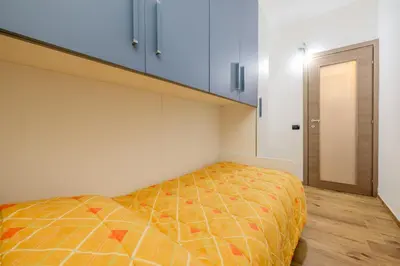 Letto o letti in una camera di AD House