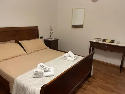 Letto o letti in una camera di Casa Frau