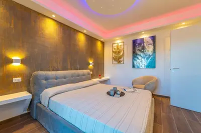 Letto o letti in una camera di la maison dorée