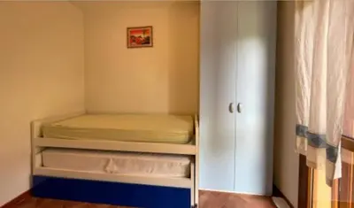 Letto o letti in una camera di Casa vacanza San Teodoro