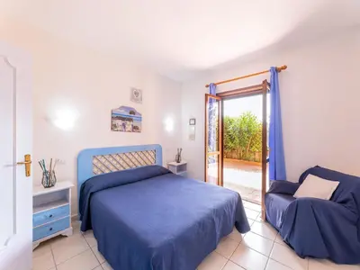 Letto o letti in una camera di Relax on the Bay of Marinella