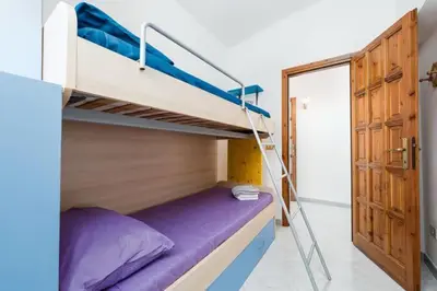 Letto o letti in una camera di Appartamento Ilenia