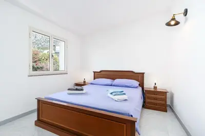Letto o letti in una camera di Appartamento Ilenia