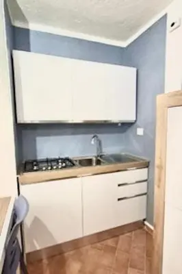 Cucina o angolo cottura di Apartment 4 beds in Marinella just 250 mt from the beach