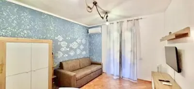 Area soggiorno di Apartment 4 beds in Marinella just 250 mt from the beach