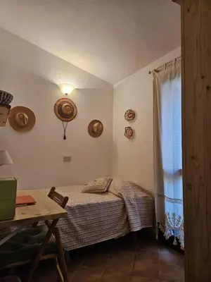 Letto o letti in una camera di Il Giardino Fiorito