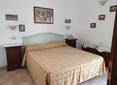 Letto o letti in una camera di Appartamento Siniscola