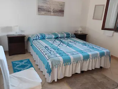 Letto o letti in una camera di Villa Pierina