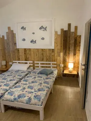 Letto o letti in una camera di Camera La Cinta