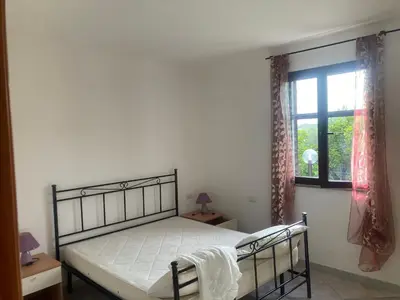 Letto o letti in una camera di Gelsomino