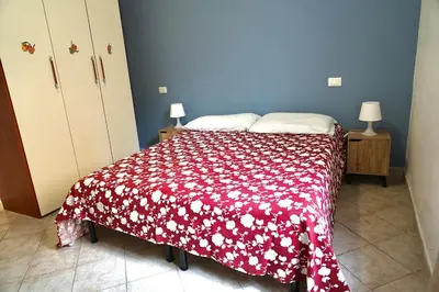 Letto o letti in una camera di Loriblu casa vacanze