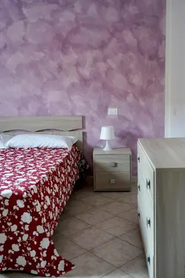 Letto o letti in una camera di Loriblu casa vacanze
