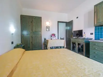 Letto o letti in una camera di Studio in Meernähe auf Sardinien