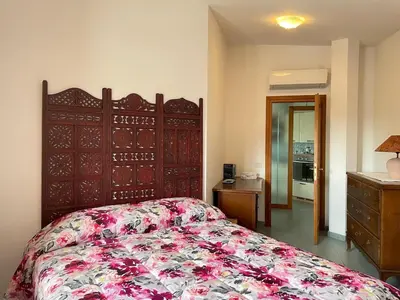 Letto o letti in una camera di Casa Vacanza Elisa