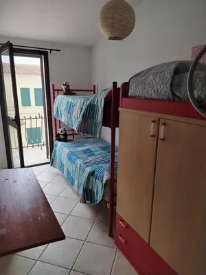 Letto o letti in una camera di La Brezza Marina