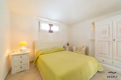Letto o letti in una camera di Villa Filomena Appartamento Con Piscina By Searly