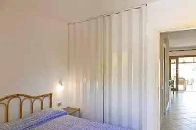 Letto o letti in una camera di Casa Franca