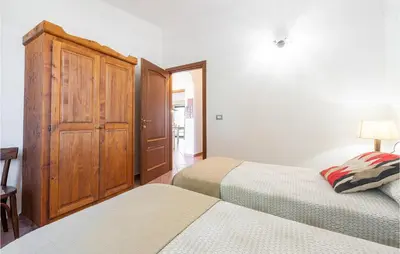 Letto o letti in una camera di Gorgeous Home In Orosei With Wifi