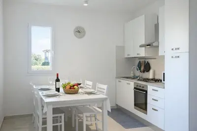 Cucina o angolo cottura di Residenza Sa Olia