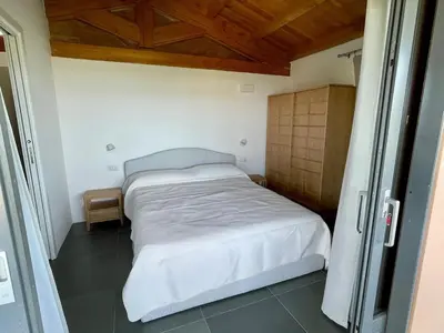 Letto o letti in una camera di Belocations - Il Giardino dell'Aldia