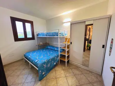 Letto o letti in una camera di Casa Sabri