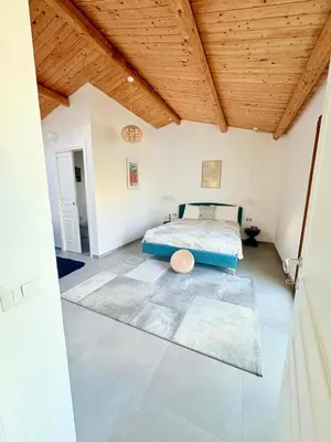 Letto o letti in una camera di ReStazzu, a new idea of Sardinian stazzu